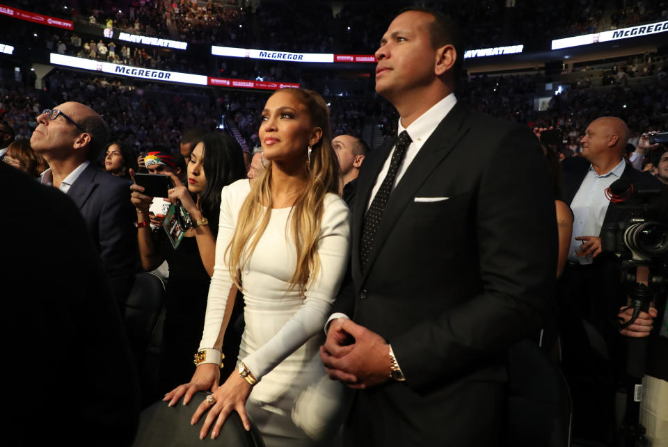 <p>Actress Jennifer Lopez and former MLB player Alex Rodriguez attend the super welterweight boxing match between Floyd Mayweather Jr. and Conor McGregor on August 26, 2017 at T-Mobile Arena in Las Vegas, Nevada. (Photo by Christian Petersen/Getty Images) </p>