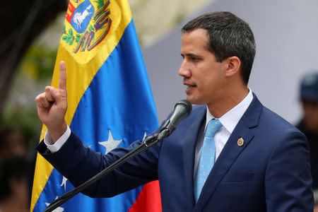 Venezuelan opposition leader Juan Guaido, who many nations have recognised as the country's rightful interim ruler, takes part in a gathering with supporters in Caracas, Venezuela, April 19, 2019. REUTERS/Manaure Quintero