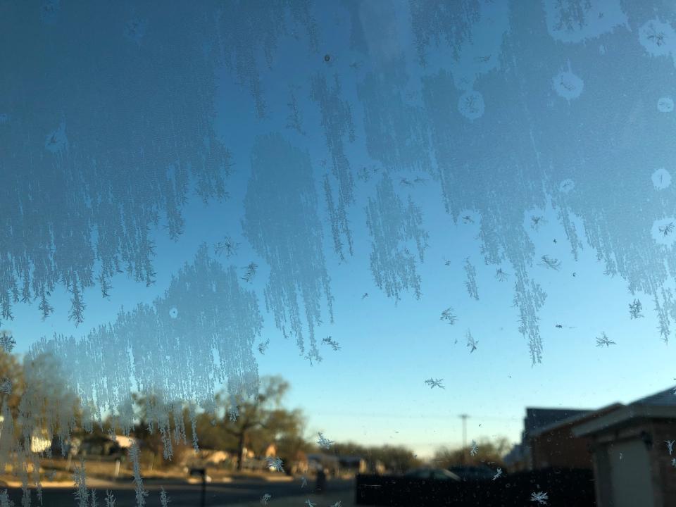 Ice covers a car window on the morning of Dec. 14, 2020.