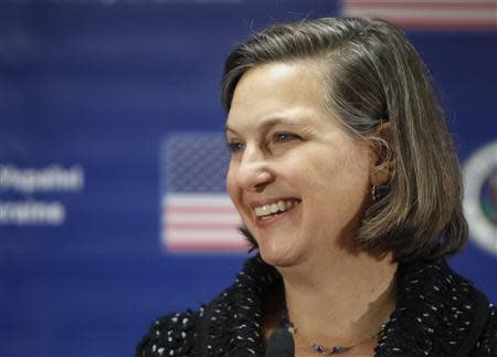 U.S. Assistant Secretary of State Victoria Nuland smiles as she addresses a news conference at the U.S. embassy in Kiev February 7, 2014. REUTERS/Gleb Garanich