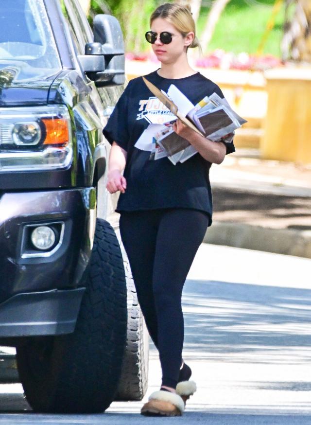 Mia Goth sports a blue top with matching leggings as she goes for