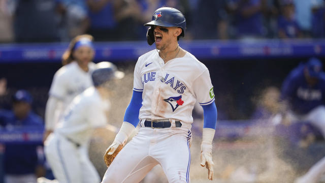 Cavan Biggio of the Toronto Blue Jays looks on from first base