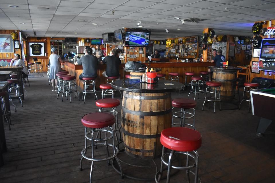Cork Bar welcomes customers on the Boardwalk at 3 Wicomico Street on Tuesday, October 3, 2023, in Ocean City, Maryland.