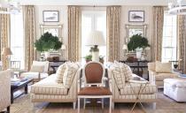 <p>It's almost a given that every room showcased in Sikes's new book is beautiful. But what makes Sikes's beautiful spaces so utterly uplifting is that comfort is <em>never</em> compromised. Here, a pair of back-to-back sofas <a href="https://www.veranda.com/home-decorators/a32356068/how-the-quarantine-will-change-home-design/" rel="nofollow noopener" target="_blank" data-ylk="slk:divides a large living room into two cozy, welcoming zones;elm:context_link;itc:0;sec:content-canvas" class="link ">divides a large living room into two cozy, welcoming zones</a>, ideal for accommodating both large groups and solo loungers. </p>