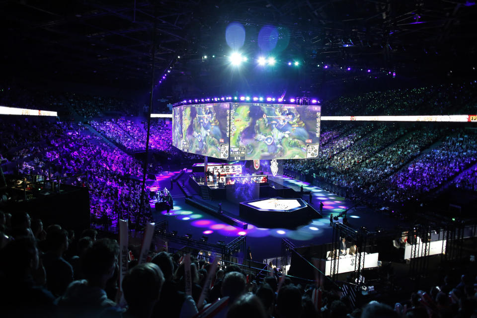 A general view during the final of League of Legends tournament between Team G2 Esports and Team FunPlus Phoenix, in Paris, Sunday, Nov. 10, 2019. The biggest e-sports event of the year saw a Chinese team, FunPlus Phoenix, crowned as world champions of the video game League of Legends. Thousands of fans packed a Paris arena for the event, which marked another step forward for the growing esports business. (AP Photo/Thibault Camus)