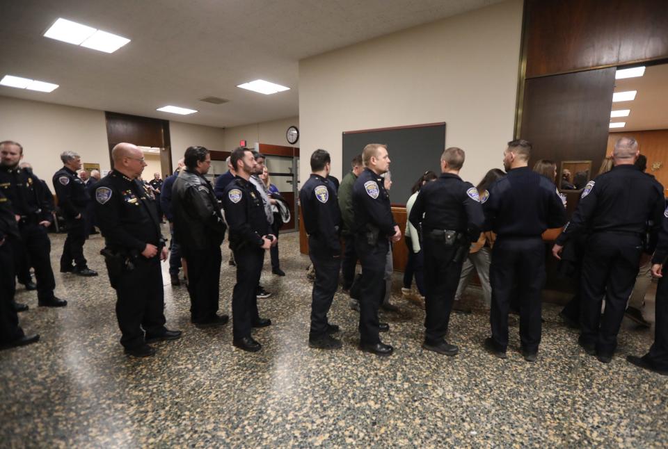 Kelvin Vickers Jr. was sentenced to life without parole for the murders of Rochester Police Officer Anthony Mazurkiewicz, Richard Collinge and MyJel Rand in 2022. Rochester police file into the courtroom prior to the sentencing.