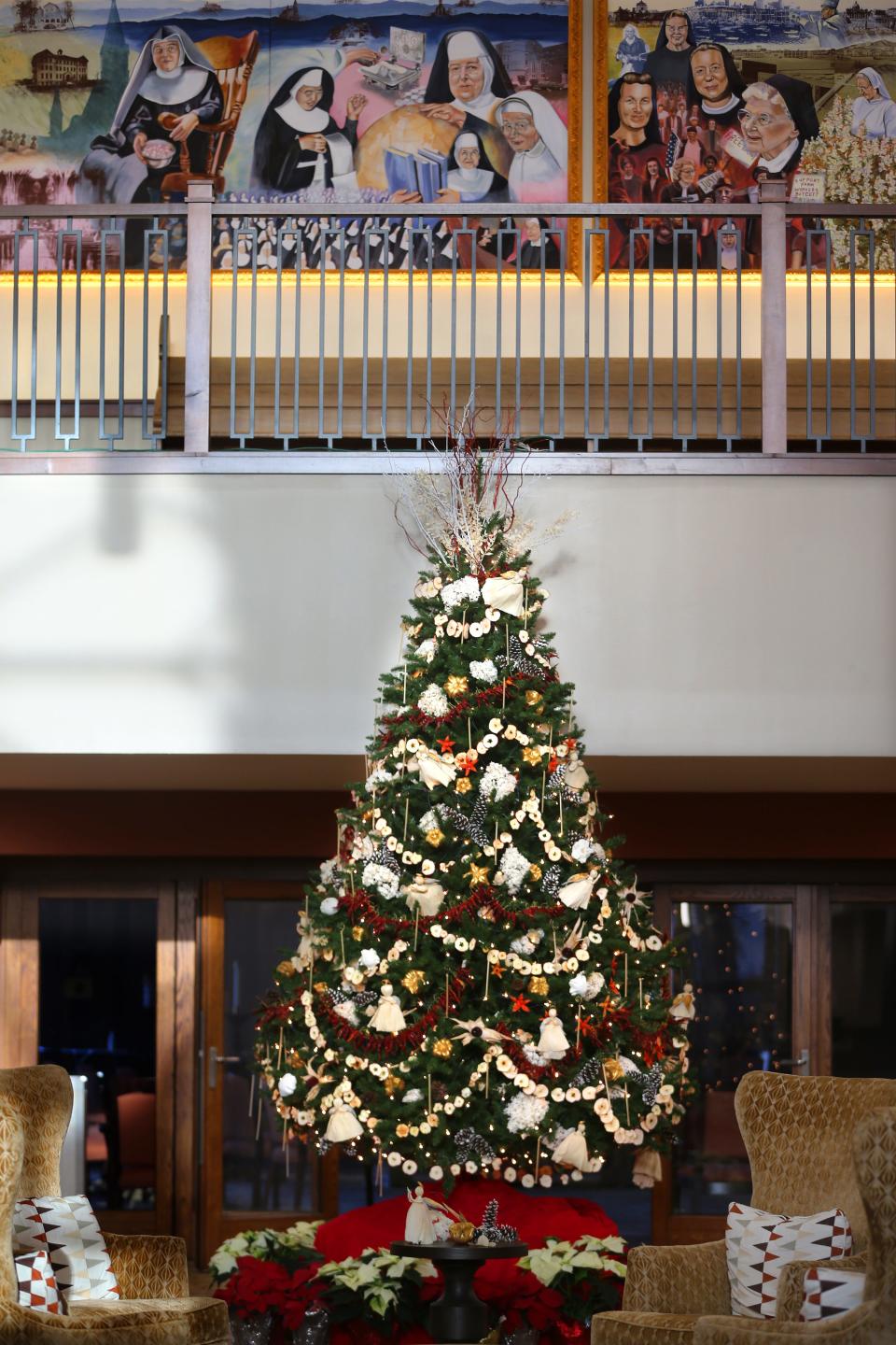 The winter tree at Sisters of St. Francis of Assisi stands in an area residents call Town Square. It's covered in home-grown ornaments.