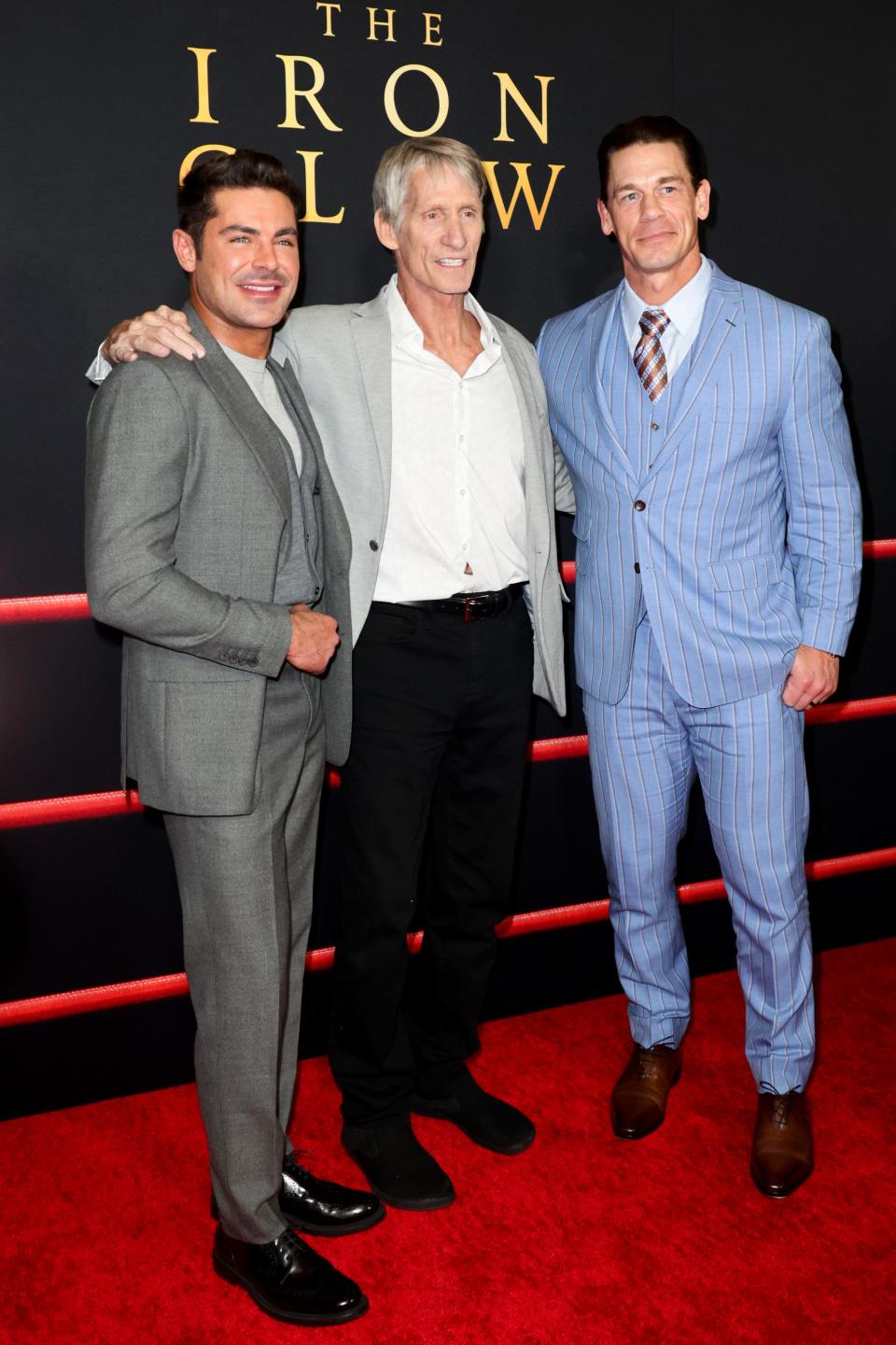 Zac Efron, star of "The Iron Claw," with wrestlers Kevin Von Erich and John Cena at the film's Los Angeles premiere on December 11, 2023.