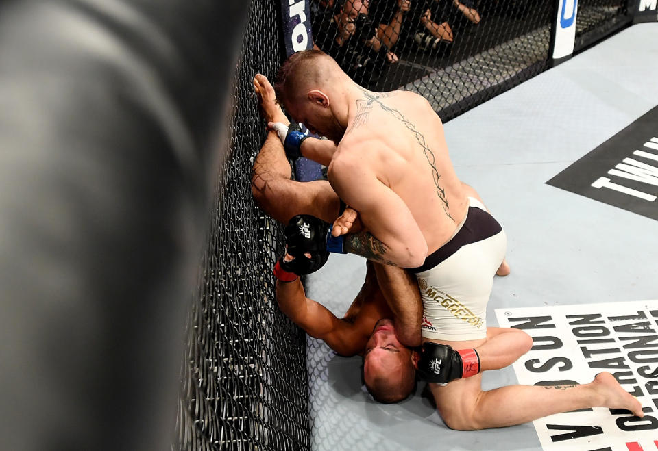 <p>Eddie Alvarez of the United States (left) fights against Conor McGregor of Ireland in their lightweight championship bout during the UFC 205 event at Madison Square Garden on November 12, 2016 in New York City. (Photo by Jeff Bottari/Zuffa LLC/Zuffa LLC via Getty Images) </p>