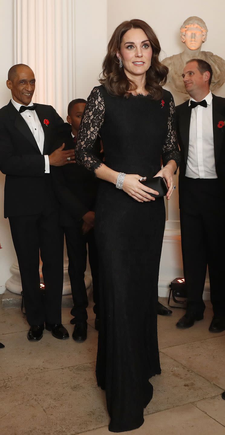 <p>In a lace Diane Von Furstenburg gown, diamond bracelet, and black clutch at the Freud Centre Gala at Kensington Palace.</p>