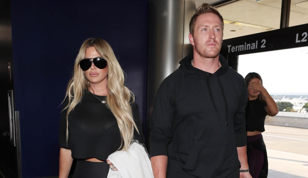 LOS ANGELES, CA - OCTOBER 12: Kim Zolciak and <span class="caas-xray-inline-tooltip"><span class="caas-xray-inline caas-xray-entity caas-xray-pill rapid-nonanchor-lt" data-entity-id="Kroy_Biermann" data-ylk="cid:Kroy_Biermann;pos:1;elmt:wiki;sec:pill-inline-entity;elm:pill-inline-text;itc:1;cat:Athlete;" tabindex="0" aria-haspopup="dialog"><a href="https://search.yahoo.com/search?p=Kroy%20Biermann" data-i13n="cid:Kroy_Biermann;pos:1;elmt:wiki;sec:pill-inline-entity;elm:pill-inline-text;itc:1;cat:Athlete;" tabindex="-1" data-ylk="slk:Kroy Biermann;cid:Kroy_Biermann;pos:1;elmt:wiki;sec:pill-inline-entity;elm:pill-inline-text;itc:1;cat:Athlete;" class="link ">Kroy Biermann</a></span></span> are seen on October 12, 2017 in Los Angeles, California (Photo by SMXRF/Star Max/GC Images)