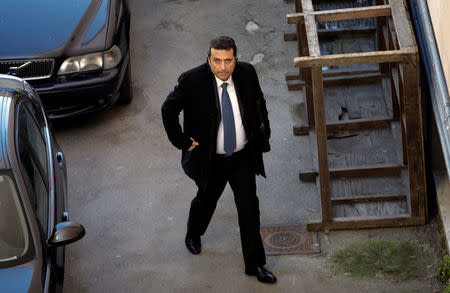 Captain of the Costa Concordia cruise liner Francesco Schettino arrives at court to attend his trial in Grosseto February 10, 2015. REUTERS/Max Rossi/File Photo