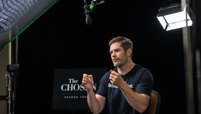 Dallas Jenkins, creator, producer, writer and director of “The Chosen,” talks to news media at the Salvation Army’s Camp Hoblitzelle in Midlothian, Texas, on Aug. 15, 2022.