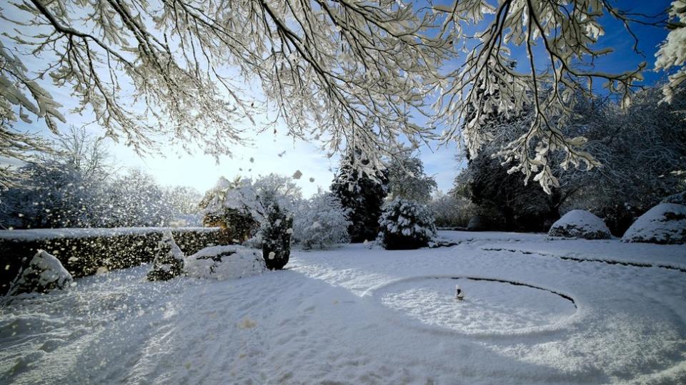 Snow covers the ground at Camp Hill in Woolton, Liverpool.