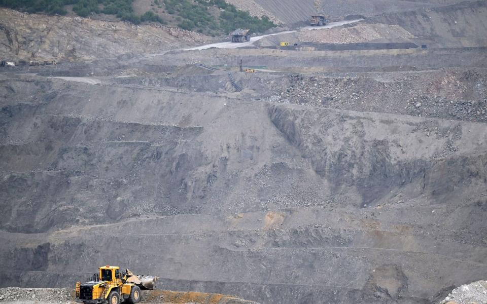 Dump trucks at the Veliki Krivelj open pit copper mine in Bor, Serbia