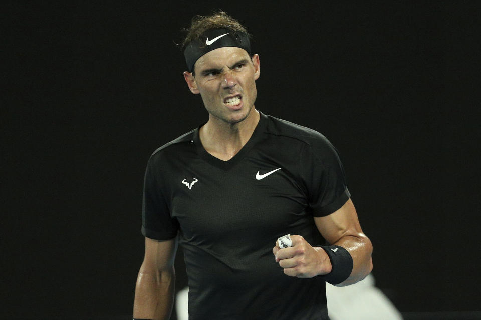 Rafael Nadal of Spain reacts during their singles match against Emil Ruusuvuori of Finland at Summer Set tennis tournament ahead of the Australian Open in Melbourne, Australia, Saturday, Jan. 8, 2022. (AP Photo/Hamish Blair)