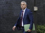 Britain's Brexit Secretary Stephen Barclay arrives for a Cabinet meeting at 10 Downing Street in London, Wednesday, Oct. 16, 2019. The European Union's chief Brexit negotiator says talks between the EU and Britain on the country's departure from the bloc are continuing after running through the night but that obstacles remain. (AP Photo/Kirsty Wigglesworth)