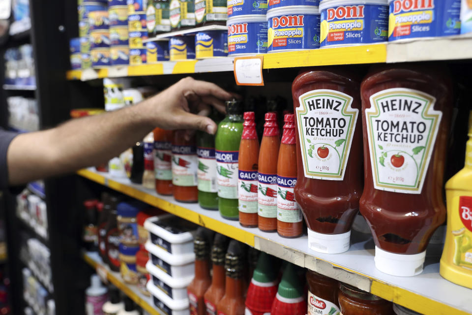 Heinz Ketchups are displayed in a grocery store in downtown Tehran, Iran, Wednesday, July 10, 2019. Whether at upscale restaurants or corner stores, American brands like Coca-Cola and Pepsi can be seen throughout Iran despite the heightened tensions between the two countries. U.S. sanctions have taken a heavy toll, but Western food, movies, music and clothing are still widely available. (AP Photo/Ebrahim Noroozi)