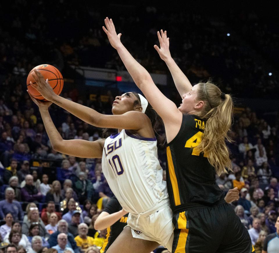 LSU forward Angel Reese (10) drives past Missouri forward Hayley Frank (43) during an NCAA college basketball game Thursday, Jan. 4, 2024, in Baton Rouge, La. (Hilary Scheinuk/The Advocate via AP)