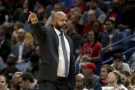 Cleveland Cavaliers coach J.B. Bickerstaff gives directions to his team during the first half of an NBA basketball game against the New Orleans Pelicans in New Orleans, Friday, Feb. 28, 2020. (AP Photo/Rusty Costanza)