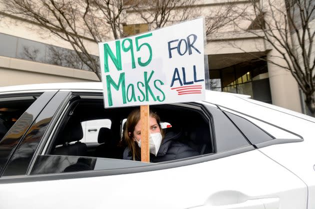 Elementary school teacher Carrie Landheer protests for stronger COVID-19 safety protocols outside Oakland Unified School District headquarters on last week in California. (Photo: via Associated Press)