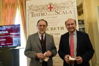 FILE - Italian conductor Riccardo Chailly, left and La Scala opera house general manager Dominique Meyer pose for photographers prior to the start of a news conference to present Giuseppe Verdi's 'Macbeth', which will open the opera season at the La Scala opera house next, Dec. 7, in Milan, Italy, on Nov. 29, 2021. As many European theaters are closed due to the pandemic, the famed Teatro alla Scala on Tuesday opens its new season Tuesday with the gala premiere of Verdi’s “Macbeth” to a fully seated house. (AP Photo/Luca Bruno)