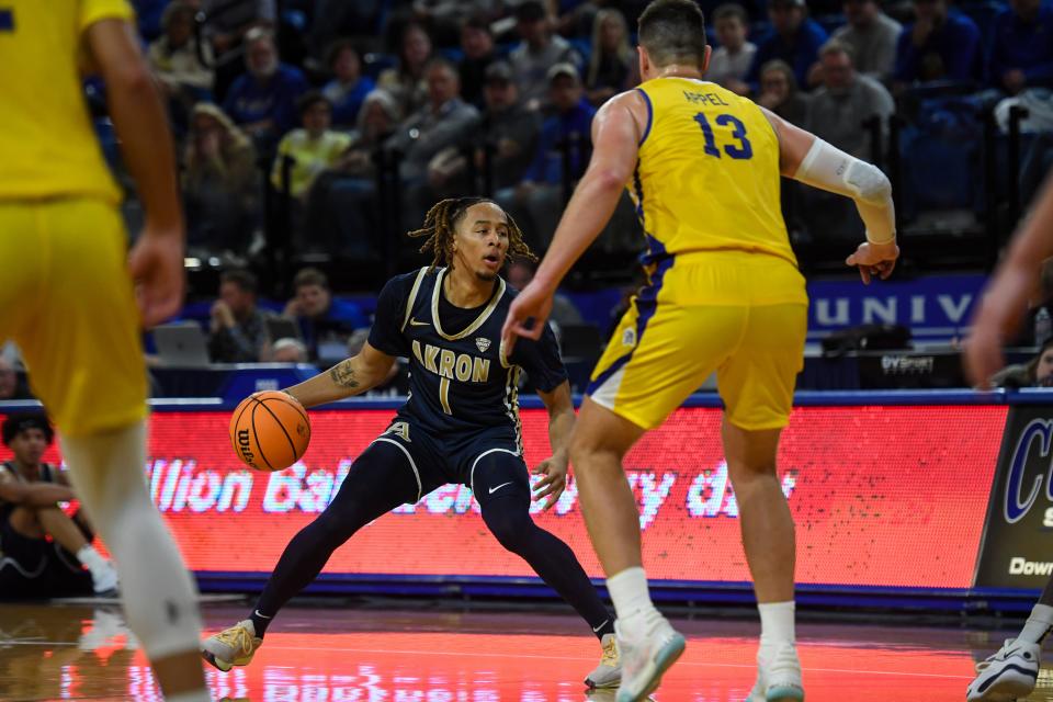 Akron's guard Shammah Scott looks for an opening at South Dakota State on Monday.