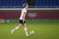 United States' Megan Rapinoe celebrates after scoring the winning goal and defeating the Netherlands in a penalty shootout during a women's quarterfinal soccer match at the 2020 Summer Olympics, Friday, July 30, 2021, in Yokohama, Japan. (AP Photo/Silvia Izquierdo)