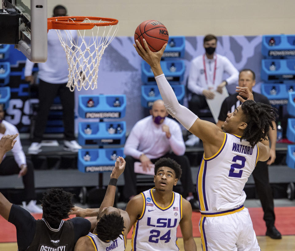 LSU forward Trendon Watford (2) pulls down a rebound during the first half of a first round game against St. Bonaventure in the NCAA men's college basketball tournament, Saturday, March 20, 2021, at Assembly Hall in Bloomington, Ind. (AP Photo/Doug McSchooler)