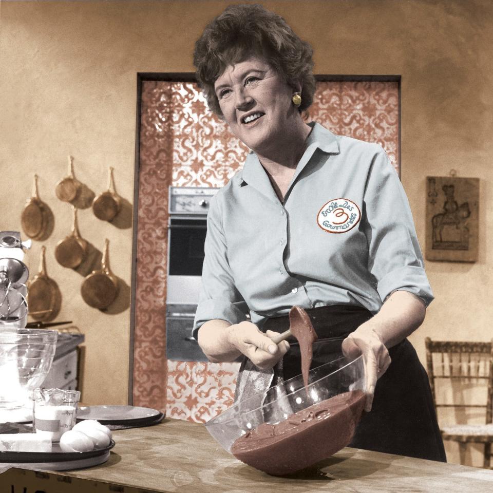 Julia Child is credited with introducing French cooking techniques to mainstream America in "The French Chef," which premiered on public television in 1963. Here, she prepares a chocolate mousse.