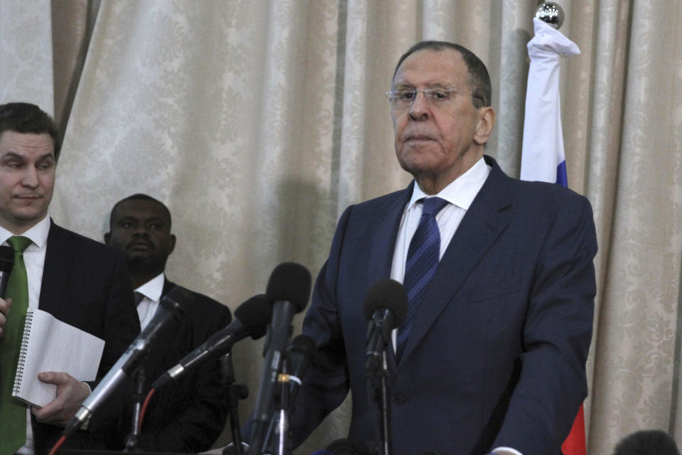 Russian Foreign Minister Sergei Lavrov and Sudanese acting foreign minister Ali al-Sadiq, not seen, give a joint press conference at the airport in Khartoum, Sudan, Thursday, Feb. 9, 2023. (AP Photo/Marwan Ali)