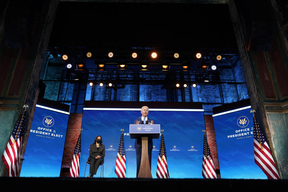 President-elect Joe Biden speaks about the COVID-19 pandemic during an event at The Queen theater, Thursday, Jan. 14, 2021, in Wilmington, Del., as Vice President-elect Kamala Harris listens. (AP Photo/Matt Slocum)