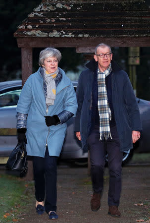 Britain's Prime Minister Theresa May and her husband Philip arrive at church, near High Wycombe, Britain, January 20, 2019. REUTERS/Hannah McKay