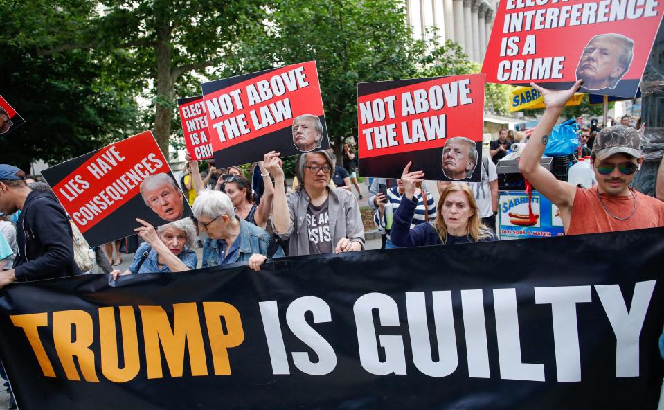 People react after former President Donald Trump is convicted in his criminal trial in New York City on May 30, 2024.