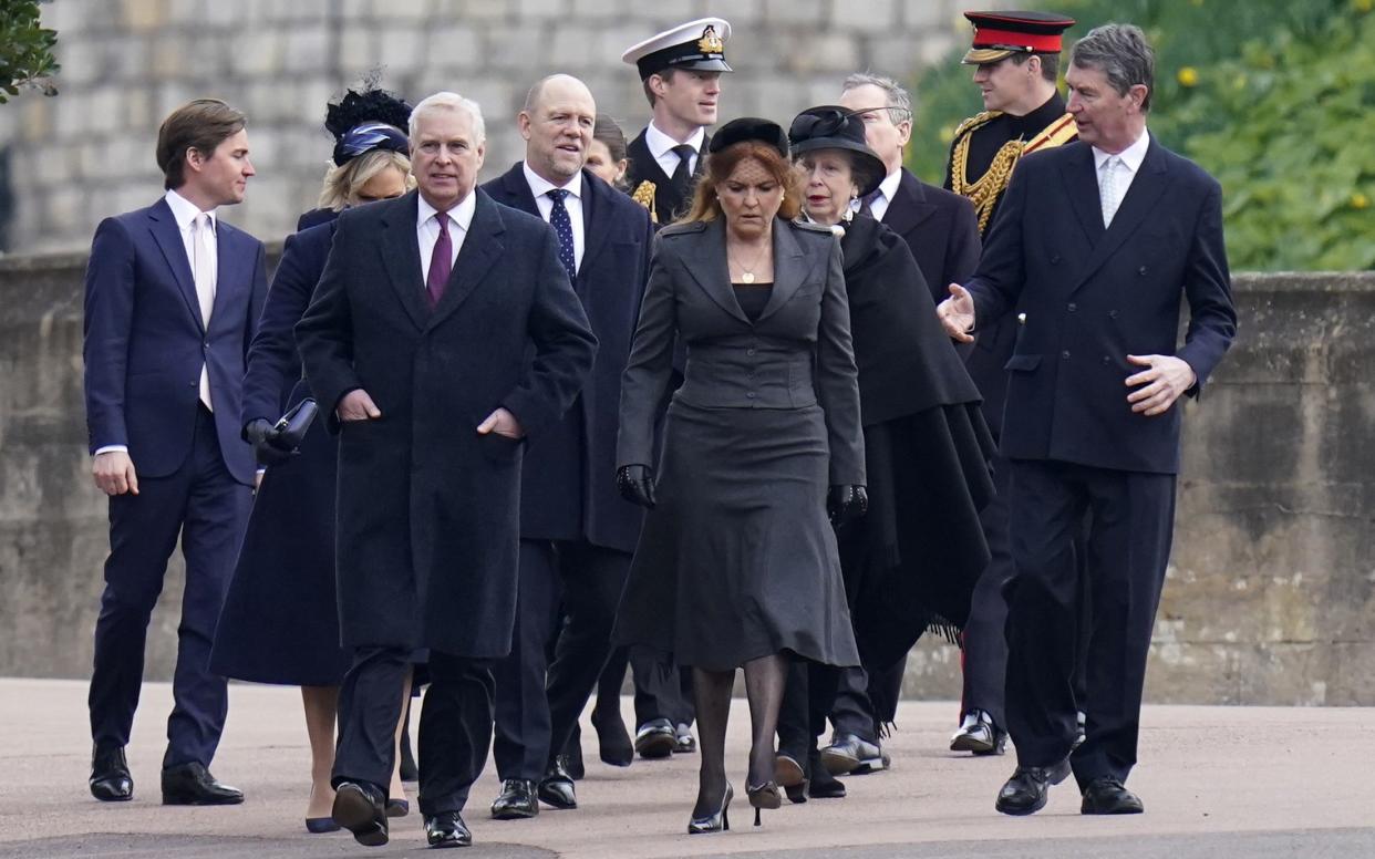 Prince Andrew leads the family to the memorial at St George's Chapel