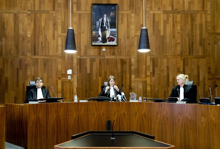 (From L) Judges Boele, Dulek-Schermers and Dousma-Valk attend the verdict of the Court of Justice in the case of the "Mothers of Srebrenica" against the Dutch State, in The Hague, on June 27, 2017