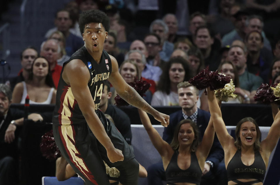 Florida State guard Terance Mann (14) celebrates after scoring against Gonzaga during the second half of an NCAA men’s college basketball tournament regional semifinal Thursday, March 22, 2018, in Los Angeles. (AP Photo/Jae Hong)