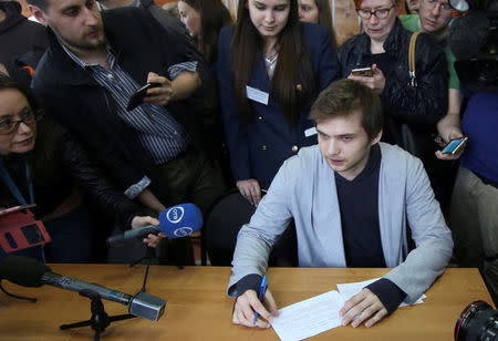 Ruslan Sokolovsky, a blogger who was found guilty by a Russian court for playing Pokemon Go inside an Orthodox church, talks to journalists during his sentencing at a court in Yekaterinburg, Russia, May 11, 2017. REUTERS/Alexei Kolchin