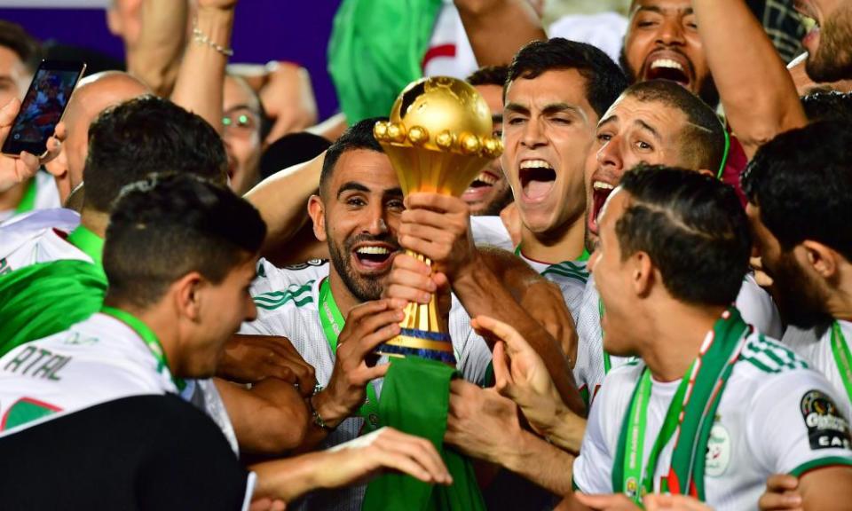 Riyad Mahrez and his Algeria teammates celebrate after winning the 2019 Africa Cup of Nations.