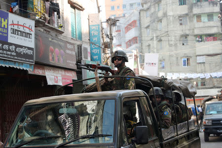 An army vehicle patrols the city during a general election in Dhaka, Bangladesh, December 30, 2018. REUTERS/Mohammad Ponir Hossain