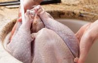 <p>Some people will rinse their turkey, chicken or other meat to try to wash away any bacteria. However, this practice will <a href="https://www.thedailymeal.com/healthy-eating/washing-your-chicken-will-turn-your-kitchen-biohazard-zone?referrer=yahoo&category=beauty_food&include_utm=1&utm_medium=referral&utm_source=yahoo&utm_campaign=feed" rel="nofollow noopener" target="_blank" data-ylk="slk:turn your kitchen into a biohazard zone;elm:context_link;itc:0;sec:content-canvas" class="link ">turn your kitchen into a biohazard zone</a>. The raw juices can splash and <a href="https://www.theactivetimes.com/healthy-living/hidden-bacteria-home?referrer=yahoo&category=beauty_food&include_utm=1&utm_medium=referral&utm_source=yahoo&utm_campaign=feed" rel="nofollow noopener" target="_blank" data-ylk="slk:spread bacteria;elm:context_link;itc:0;sec:content-canvas" class="link ">spread bacteria</a> all over your kitchen counter and workspace.</p>