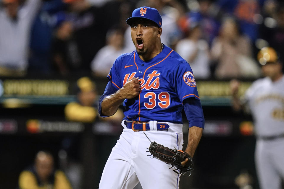 New York Mets relief pitcher Edwin Diaz (39) celebrates after the team's baseball game against the Milwaukee Brewers on Thursday, June 16, 2022, in New York. The Mets won 5-4. (AP Photo/Frank Franklin II)