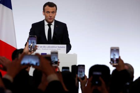 French President Emmanuel Macron delivers a speech to members of France's Chinese community to mark Chinese New Year, at the Elysee Palace in Paris, France, February 16, 2018.   REUTERS/Ian Langsdon/Pool