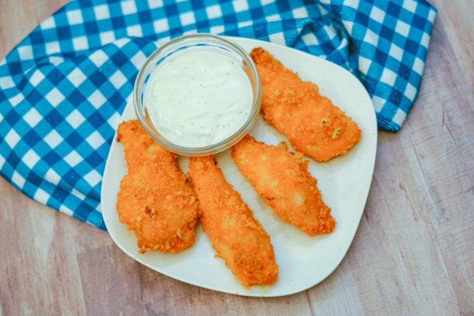 <p>If your favorite Taylor Swift album is <em>Red</em> and you like chicken fingers like Taylor does, this is the perfect movie snack recipe for you. Just be sure to pack some extra napkins.</p><p><strong>Get the recipe: </strong><a href="https://parade.com/945920/pambeth/3-ingredient-baked-cheetos-chicken-fingers-recipe/" rel="nofollow noopener" target="_blank" data-ylk="slk:Baked Cheetos Chicken Fingers;elm:context_link;itc:0;sec:content-canvas" class="link "><strong>Baked Cheetos Chicken Fingers</strong></a></p>