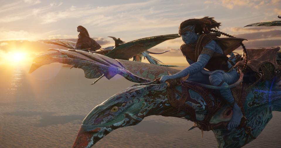 Neytiri (Zoe Saldana), left, and Jake Sully (Sam Worthington) in "Avatar: The Way of Water."