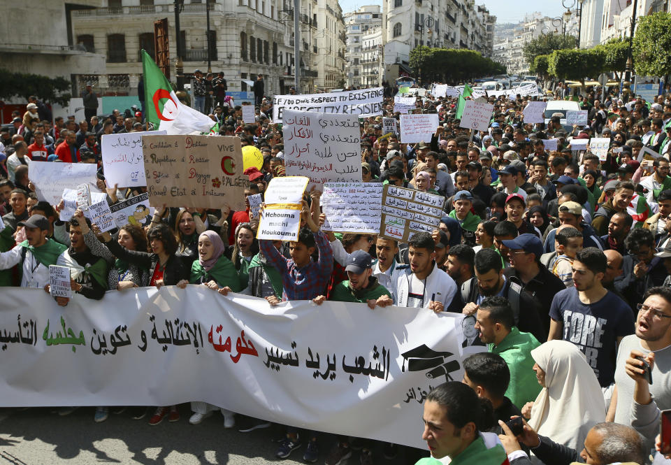 Algerian demonstrators stage a protest in Algiers, Algeria, April 2, 2019. Algerian protesters and political leaders are expressing concerns that ailing President Abdelaziz Bouteflika's departure will leave the country's secretive, distrusted power structure in place. (AP Photo/Anis Belghoul)
