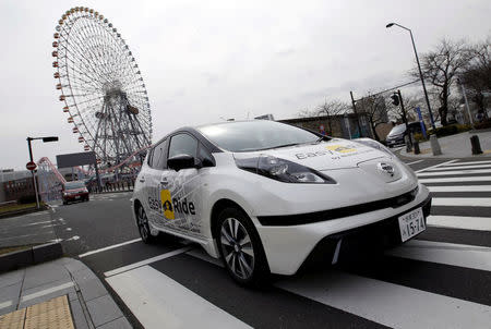 A self-driving vehicle, based on Nissan Leaf electric vehicle (EV), for Easy Ride service, developed by Nissan and mobile gaming platform operator DeNA Co, is seen during its media preview in Yokohama, Japan, February 21, 2018. Picture taken February 21, 2018. REUTERS/Toru Hanai