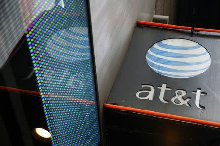 The signage for an AT&T store is seen in New York, New York October 29, 2014. REUTERS/Shannon Stapleton/File Photo