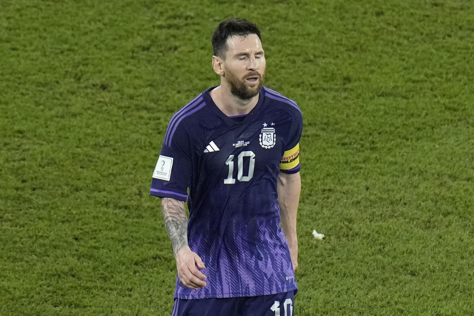 Argentina's Lionel Messi reacts as he walks off the field at the half time during the World Cup group C soccer match between Poland and Argentina at the Stadium 974 in Doha, Qatar, Wednesday, Nov. 30, 2022. (AP Photo/Hassan Ammar)