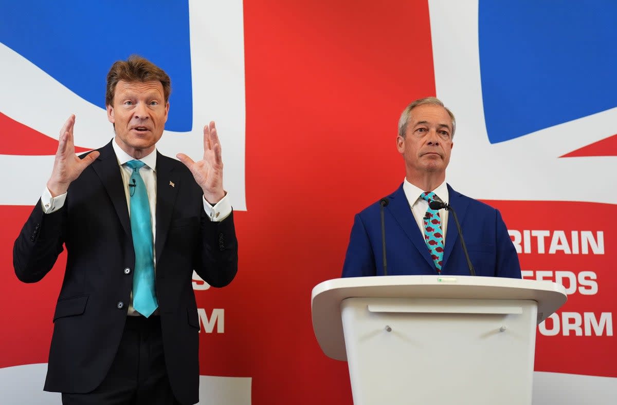 Leader of Reform UK Nigel Farage (right) and Party Chairman Richard Tice on  Monday (James Manning/PA Wire)